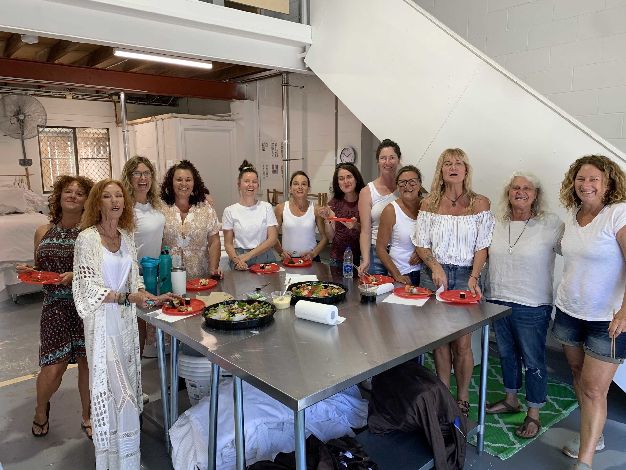 ANZ commits $250,000 to help rural and regional communities through Seeds of Renewal, a group of female volunteers standing around a metal table
