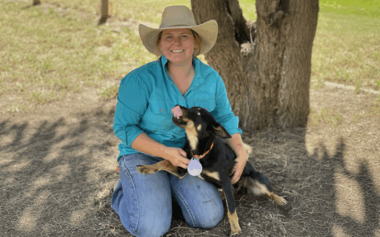 Young woman with working dog