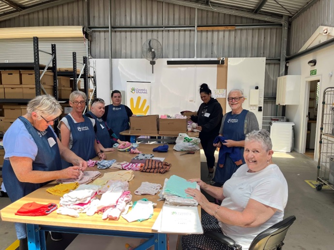 Volunteers around a table