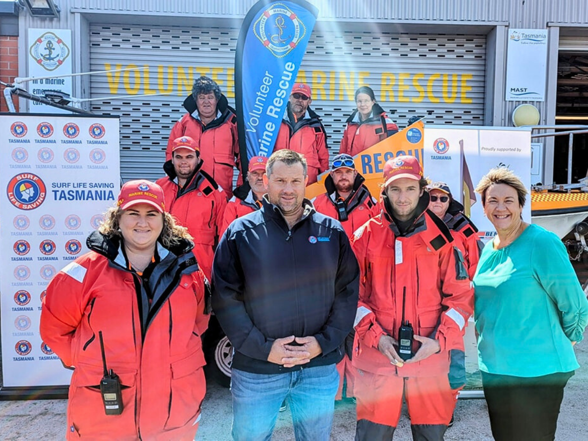 Surf Life Saving Tasmania team pose for a picture in uniform.