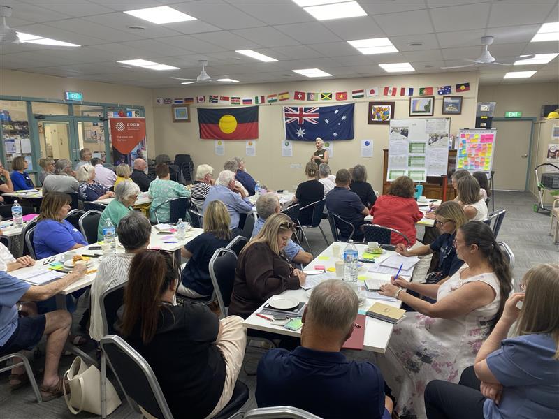 Community members participating in a workshop